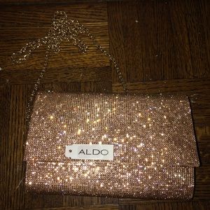 Rose gold bejeweled clutch